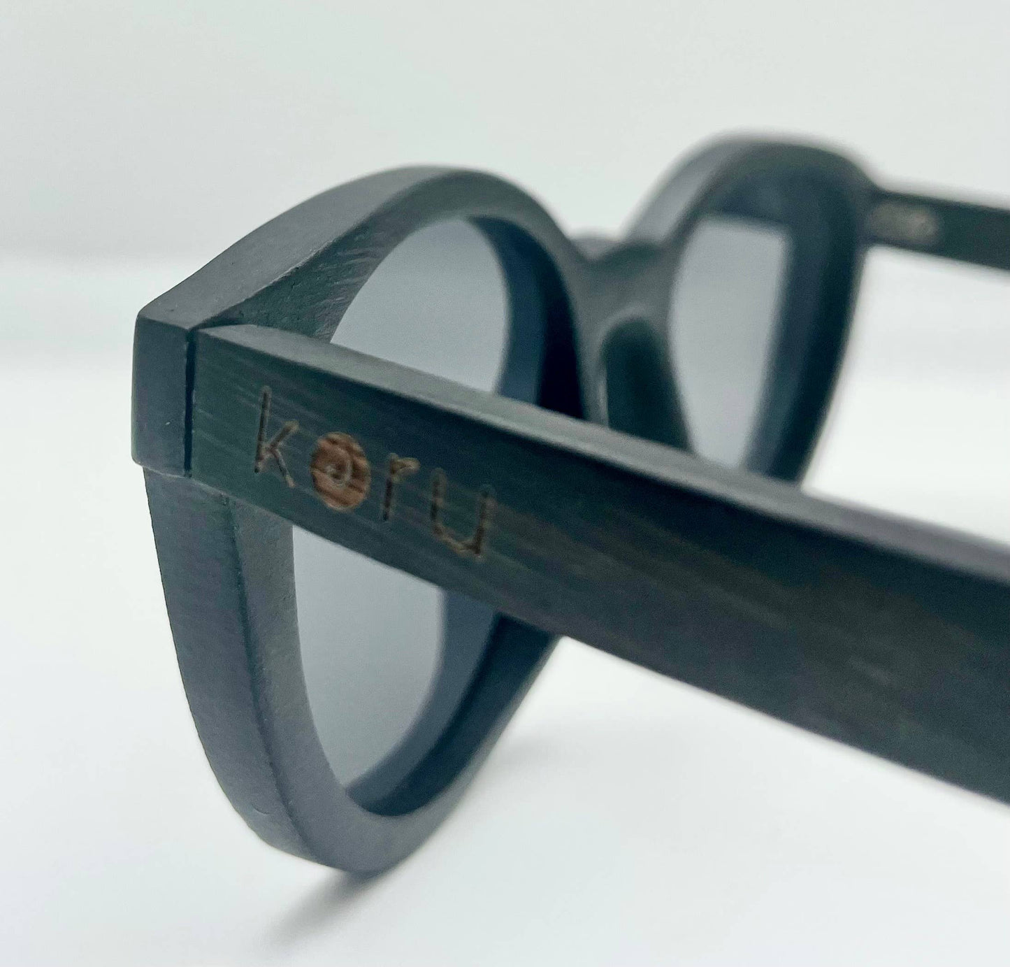 Koru Eco Brand | The Koru Kat Bamboo Floating Sunglasses w/ Bamboo Case: Grey Lense
